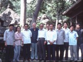 Khoan (second from left) and Michael Sullivan (fourth from left) with Song Wenzhi (fifth from left),, Photograph courtesy of Khoan and Michael Sullivan. © Michael Sullivan