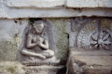 Fig. 9.  Female devotee with pendant earrings. Stone relief. Chabahil stupa, Kathmandu, 7th-8th cent. © Amy Heller