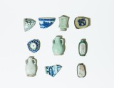 Group of perfume bottles and cup sherds
