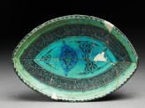 Dish with vegetal and calligraphic decoration