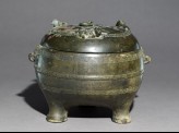 Ritual food vessel, or ding, with seated ox on the lid