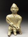 Greenware burial figure of man holding a staff (EA1956.970)