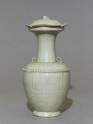 Greenware vase with flower-shaped lid