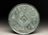 Mirror with nine directional points and T-shaped designs (EA1956.1562)