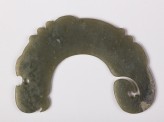 Notched pendant in the form of a dragon