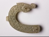 Semi-circular pendant in the form of a dragon