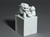 Porcelain seal surmounted by shishi, or lion dog, and pup