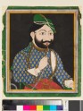 Bearded man wearing a green turban