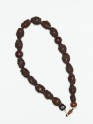 Buddhist rosary with beads in the form of monks