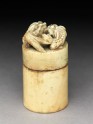 Ivory seal and box surmounted by two lions and with the legend 