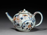 Small fluted teapot with floral decoration