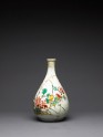 Bottle with bird amid peonies and grasses