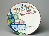 Petalled plate depicting prunus and camellia growing by a terrace