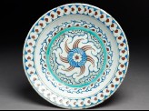 Dish with whirling rosette and prunus blossom