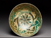 Bowl with rosette and interlaced tendrils