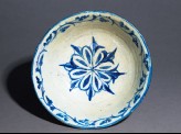 Bowl with rosette and vegetal scroll