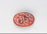 Oval bezel seal with nasta’liq inscription and floral decoration (EA1980.11)