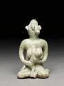 Greenware figure of mother and child