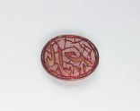 Oval bezel seal with nasta’liq inscription and floral decoration (EA1980.17)