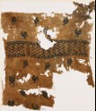 Textile fragment with chalices, fish, and inscription