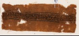 Textile fragment with inscription