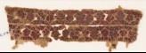 Textile fragment with bands of scrolls