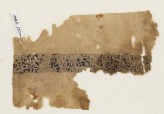Textile fragment with naskhi inscription and scrolls, probably from a garment