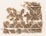 Textile fragment with band of linked diamond-shapes