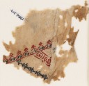 Textile fragment with linked crenellations and inscription (EA1984.217)
