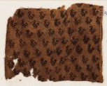 Textile fragment with birds with curving tails, probably from a tunic (EA1984.221)