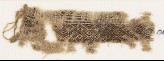 Textile fragment with linked diamond-shapes and hooks (EA1984.251)