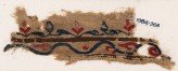 Textile fragment with vine and leaves (EA1984.266)