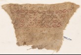 Textile fragment with interlacing chain, probably from a cuff (EA1984.270)