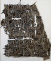Textile fragment with linked diamond-shapes, hexagons, and pseudo-inscription
