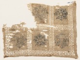 Textile fragment with interlace rosettes, stars, and flowers