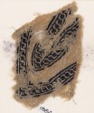 Textile fragment with linked scrolls of S-shapes, possibly from a garment (EA1984.290)