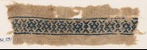 Textile fragment with X-shapes and hooks (EA1984.291)