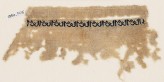 Textile fragment with repeated inscription, probably from a garment