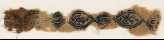 Textile fragment with two-headed birds and inscription