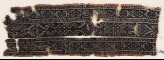 Textile fragment with linked diamond-shapes and arrowheads (EA1984.344)