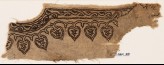 Textile fragment from the neck of a garment with vines and leaves (EA1984.351)