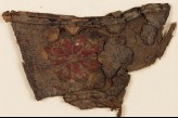 Textile fragment with rosette, possibly from a slipper (EA1984.356)