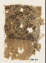 Textile fragment with eight-pointed stars and lozenges