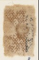Textile fragment with linked diamond-shapes containing S-shapes (EA1984.566)