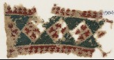 Textile fragment with diamond-shapes containing Maltese crosses (EA1984.576)