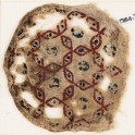 Roundel textile fragment with interlacing hexagons