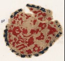 Textile fragment, possibly with a crescent-shaped vessel and two birds