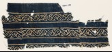 Textile fragment with bands of vines and leaves