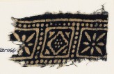 Textile fragment with squares, rosettes, and a diamond-shape (EA1990.159)