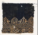 Textile fragment with birds, possibly tree-shapes, and stylized plants (EA1990.167)